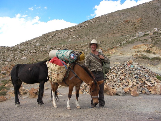 Our friend with his two horses on the kora.  Mt. Kailash, Tibet.